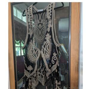 Black mesh plus embroidered vest with intricate scrollwork